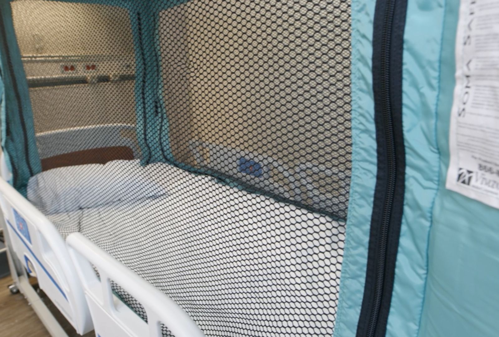 A close up photo of the black Soma Safe Enclosure netting