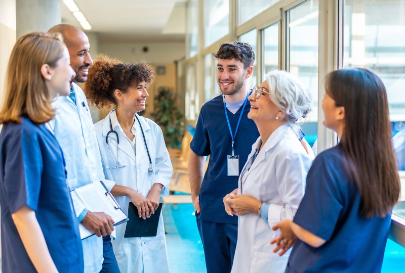 Group of doctors standing having a conversation