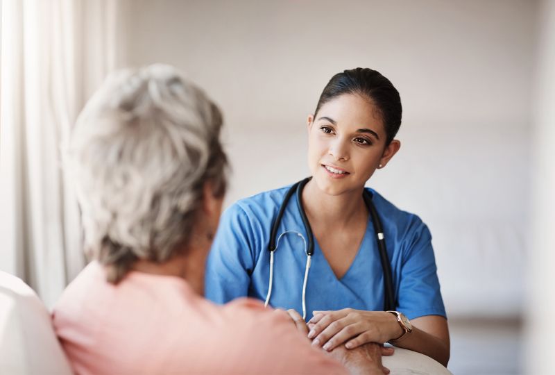 Nurse talking to patient